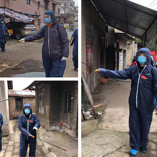 周原和吳慶同其他隊員一起開展社區衛生消毒工作.png